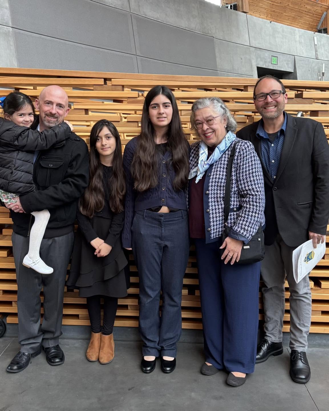 A multi-generational OLG family gathered together